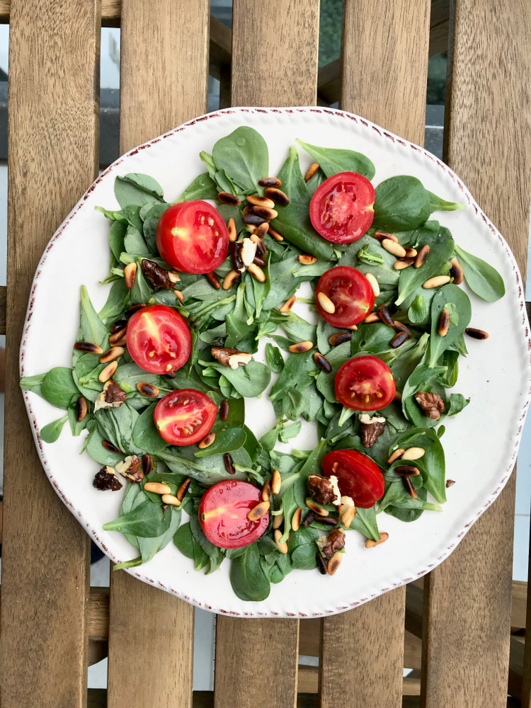 Purslane Salad with Walnut, Pine Nuts, Cherry Tomatoes and Olive Oil.